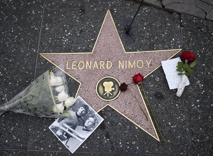 Flowers, a note and a picture adorn the Hollywood Walk of Fame star of actor Leo