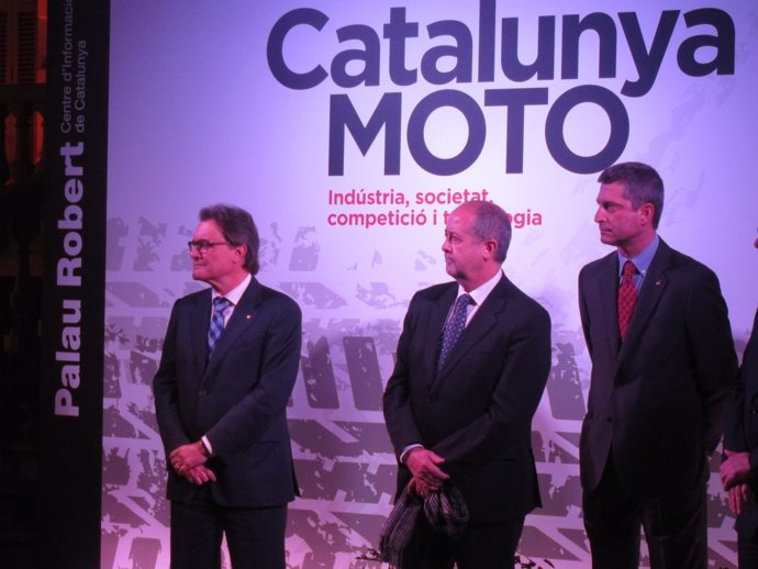 El presidente Artur Mas, el conseller Felip Puig y el concejal Jordi Martí 