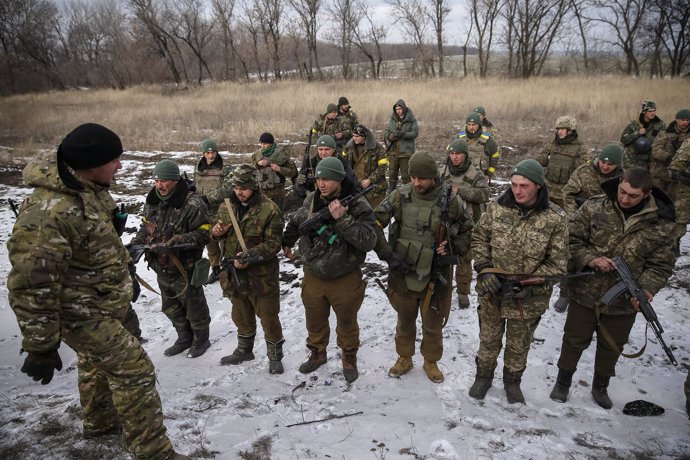 Ukrainian servicemen who fought in Debaltseve are seen near Artemivsk