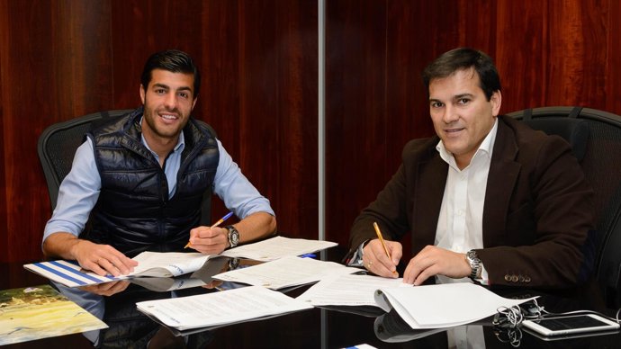 Vicente Casado y Miguel Torres, en el momento de la ampliación con el Málaga