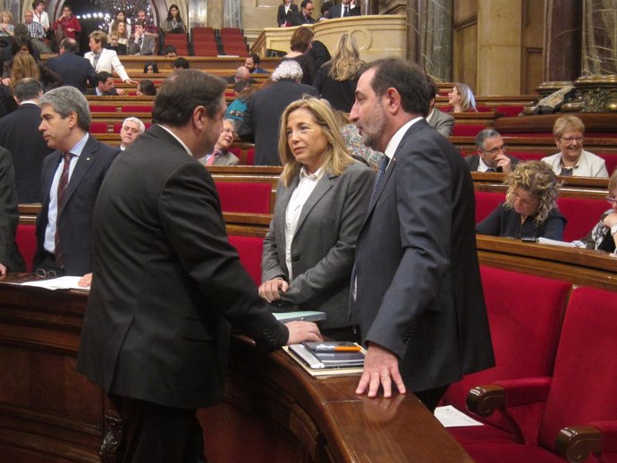 Los consellers J.Ortega R.Espadaler y J.M.Pelegrí en el pleno del Parlament