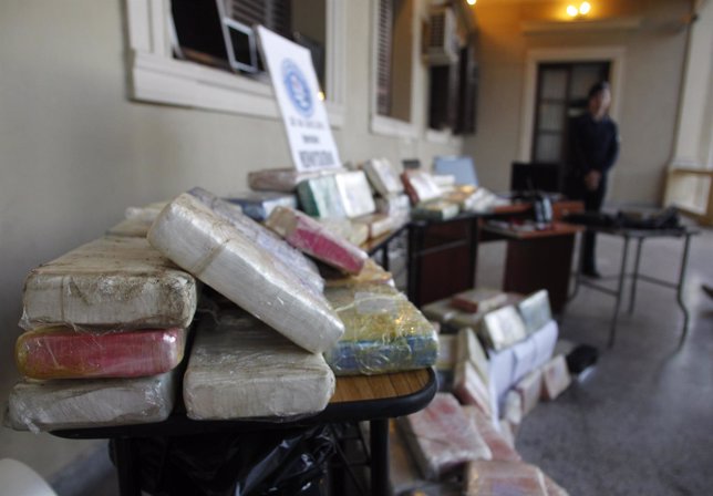 Cocaine packages weighing more than 119 kg are displayed at the Narcotics unit o