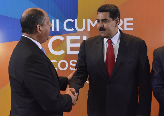 Presidente de Costa Rica Luis Guillermo Solis da la bienvenida a Nicolás Maduro