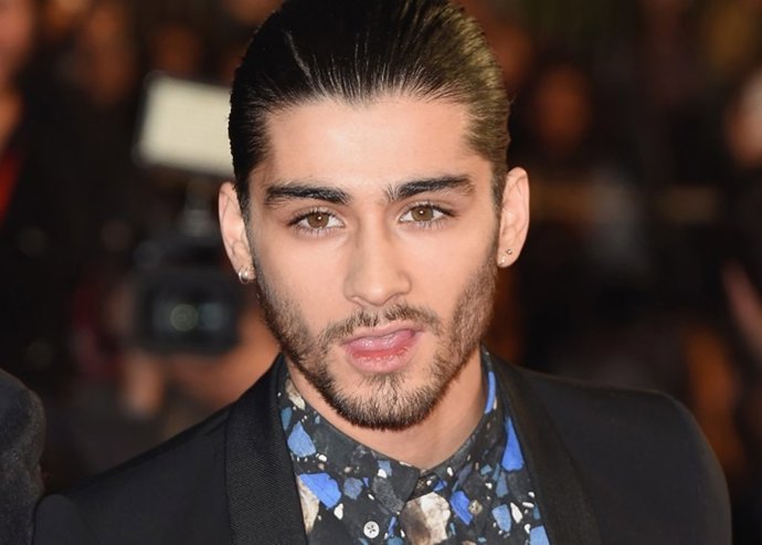 CANNES, FRANCE - DECEMBER 13:  One Direction member Zayn Malik attends the NRJ 