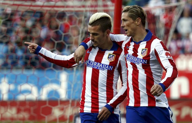 Griezmann celebra con Torres el 2-0