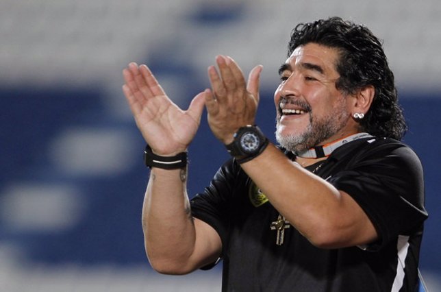 Argentine soccer legend Diego Maradona, coach of UAE's Al-Wasl, claps after his 