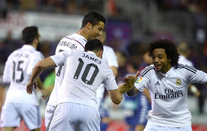 Marcelo y James celebran uno de los goles.