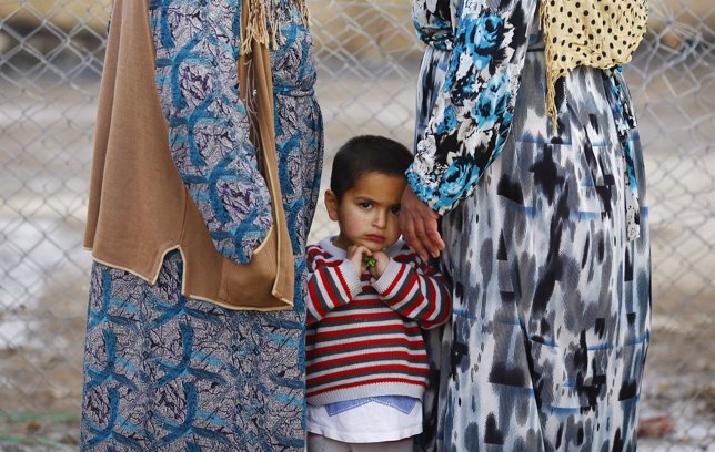 Un niño kurdo refugiado en Turquía tras huir de la región siria de Kobani