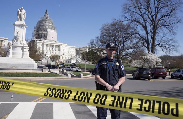 Police guard the U.S. Capitol grounds after a shooting took place, in Washington
