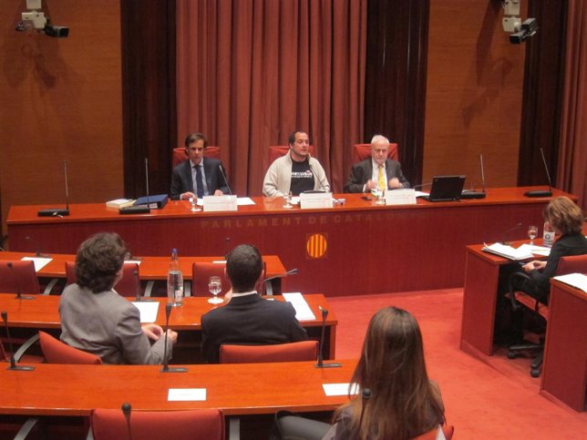 Francisco Marco, David Fernández (CUP) y el letrado Francesc Pau