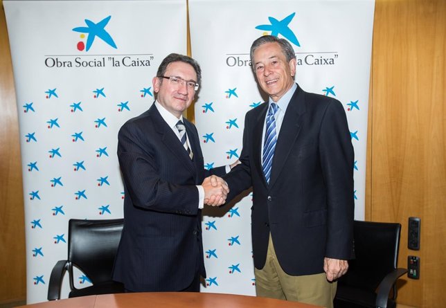 Giró y Sanz en la firma del acuerdo de colaboración en Huesca