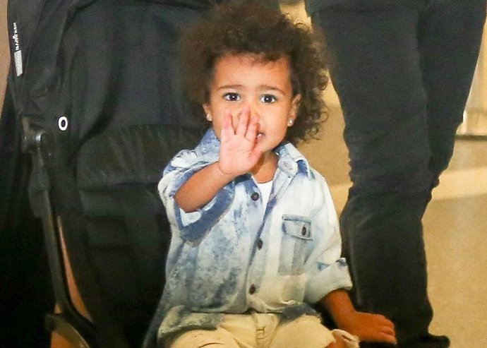 Los Angeles, CA - Kanye West and Kim Kardashian were spotted arriving at LAX Air