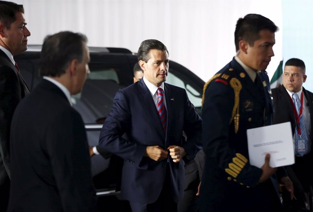 Mexico's President Enrique Pena Nieto arrives for the first plenary session of t