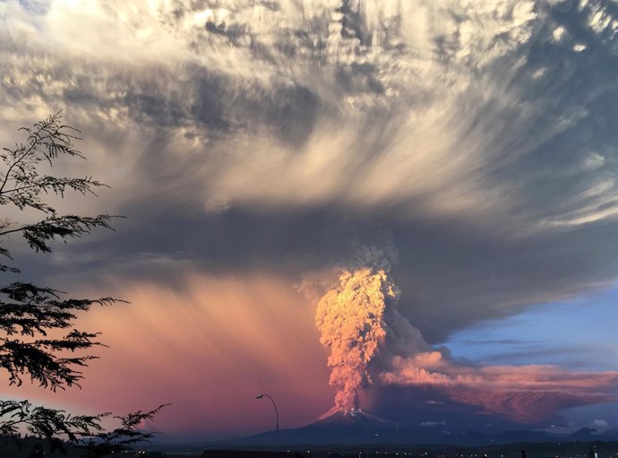 Smoke and ash rise from the Calbuco volcano as seen from the city of Puerto Mont