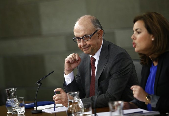 Cristóbal Montoro y Soraya Sáenz de Santamaría.