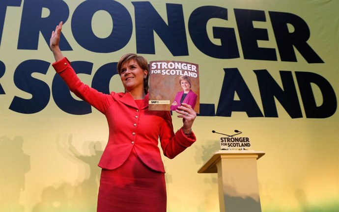 A Scottish National Party (SNP) leader Nicola Sturgeon delivers their election m