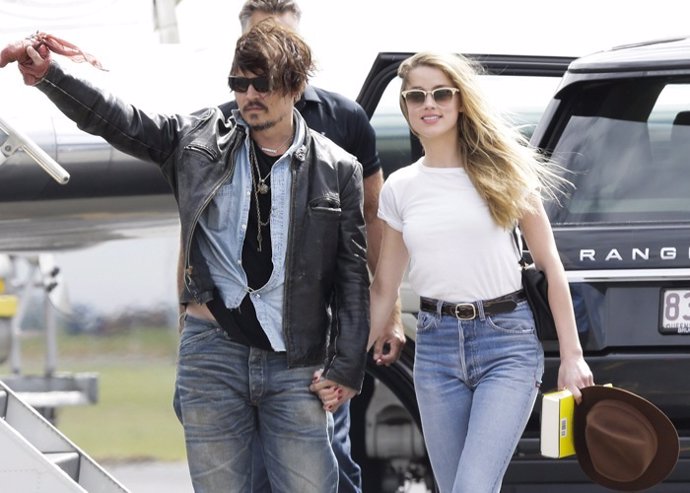 JOHNNY DEPP AND NEW WIFE AMBER HEARD ARRIVE ON THEIR PRIVATE JET AT BRISBANE AIR