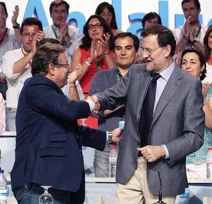 Zoido y Rajoy en un acto
