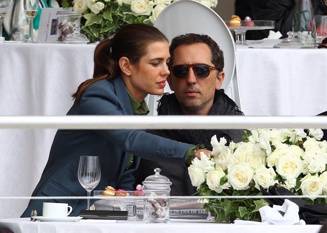 NO CREDIT - Charlotte Casiraghi attends with Gad Elmaleh the Gucci Gold Cup duri
