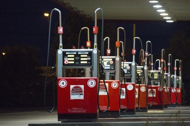 A row of gas pumps is seen at a petrol station after a weekend of record gasolin
