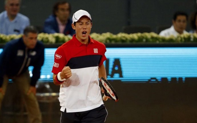 Kei Nishikori celebra su triunfo ante Ferrer en el Mutua Madrid Open 2015