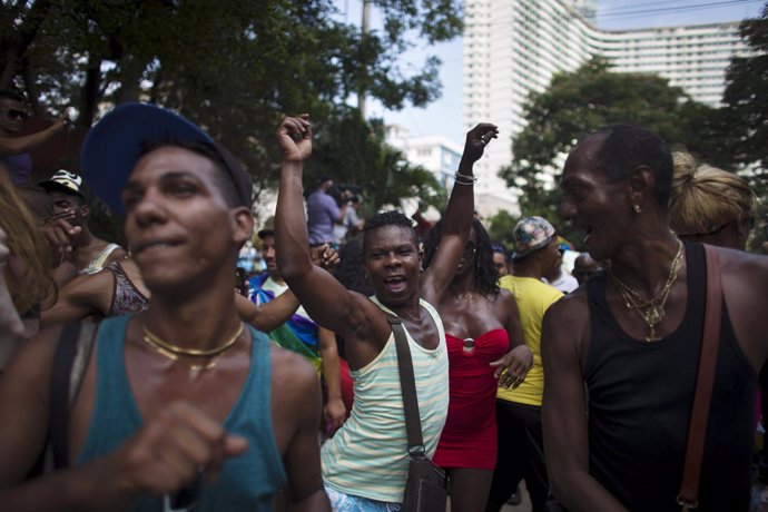 People dance during the Eighth Annual March against Homophobia and Transphobia i