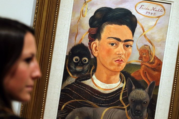 The painting "Autoportrait au Petit Singe" by Mexican artist Frida Kahlo during 