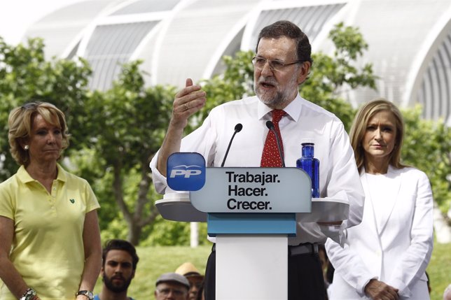 Mariano Rajoy, Aguirre y Cifuentes en un acto en Madrid