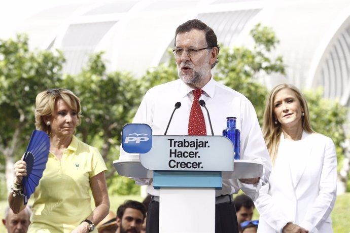 Mariano Rajoy, Aguirre y Cifuentes en un acto en Madrid
