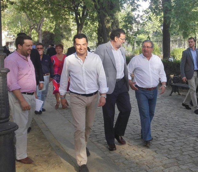 Moreno, Rajoy y Zoido, en Sevilla