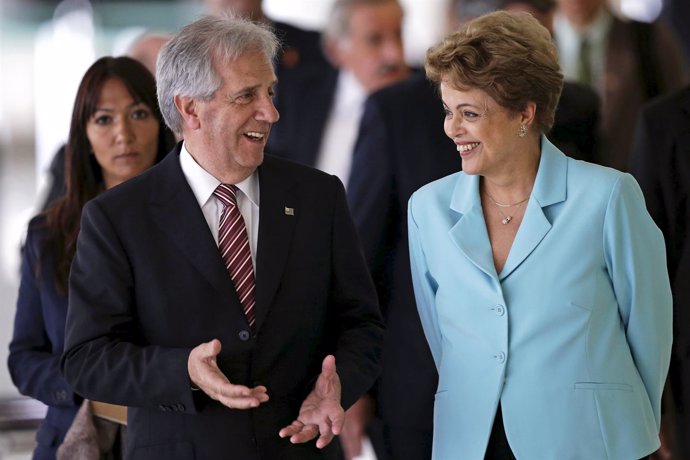 Uruguayan President Vazquez talks to Brazilian President Rousseff during a meeti