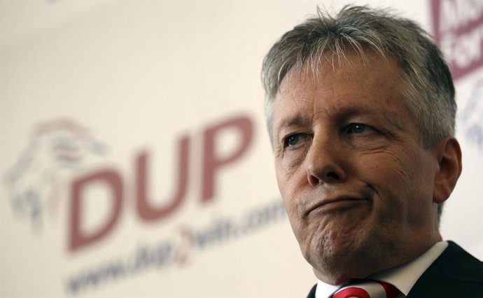 Democratic Unionist Party leader, Peter Robinson, listens to a question during t
