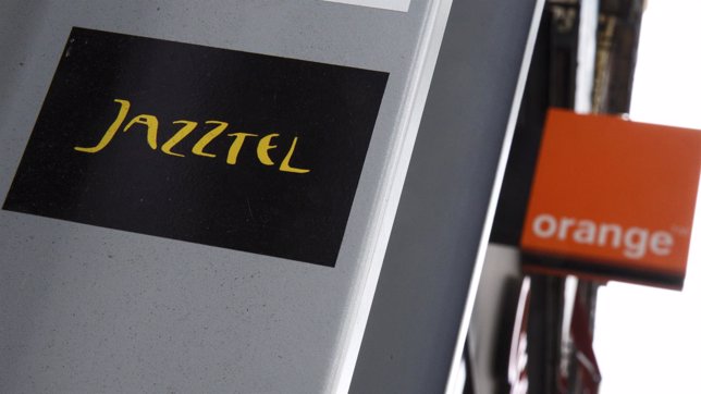 The logos of Jazztel and Orange are pictured in Madrid