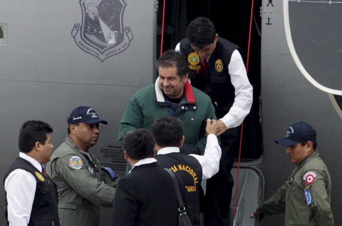 Belaunde, former campaign adviser of Peru's President Humala, is escorted by Per