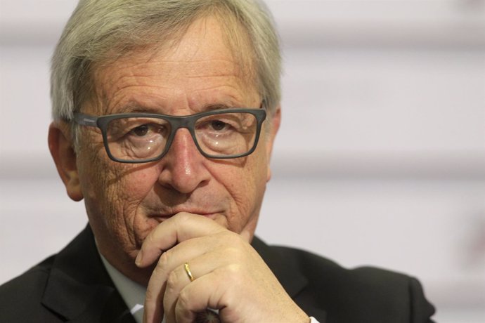European Commission President Juncker gestures as he looks on before the Eastern