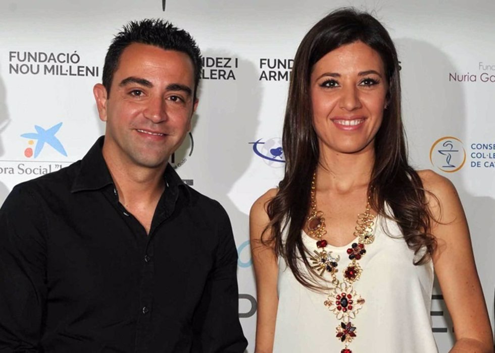 Xavi Hernández y su mujer