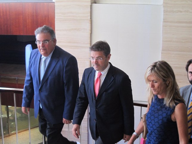 El ministro de Justicia, Rafael Catalá, y la delegada Teresa Palmer