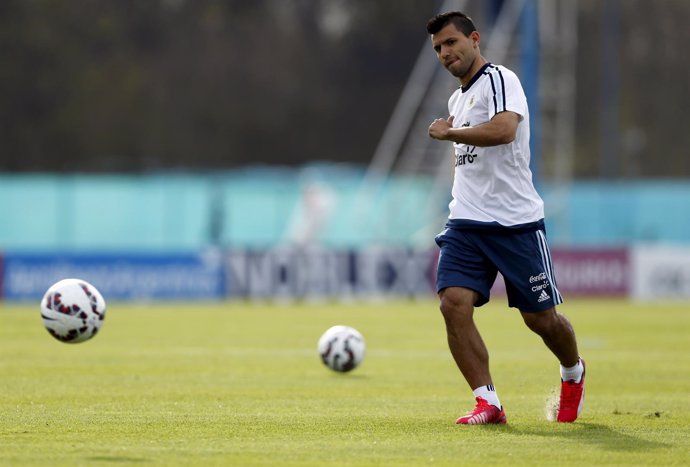 Argentina's Aguero kicks the ball during a training session in Buenos Aires