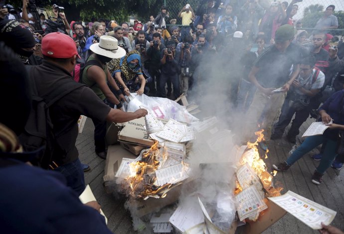 Activists burn ballots and electoral materials in Tixtla, Guerrero