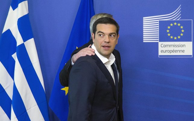 Greek Prime Minister Alexis Tsipras is welcomed by European Commission President