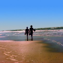 Extranjeros en una playa de Huelva.