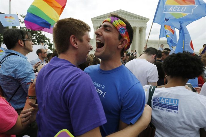 Gay rights supporters celebrate outside the U.S. Supreme Court building in Washi