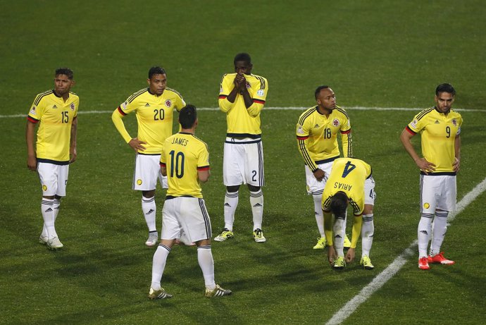 Colombia players react after their loss to Argentina in penalty kicks in their C