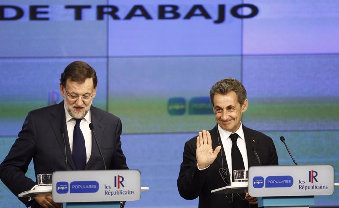 Rajoy y Sarkozy en la sede nacional del PP