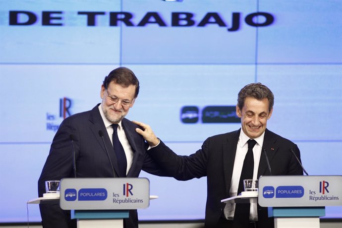 Rajoy y Sarkozy en la sede nacional del PP