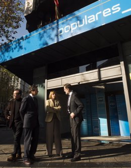 Mariano Rajoy, María Dolores de Cospedal y Carlos Floriano en la sede del PP