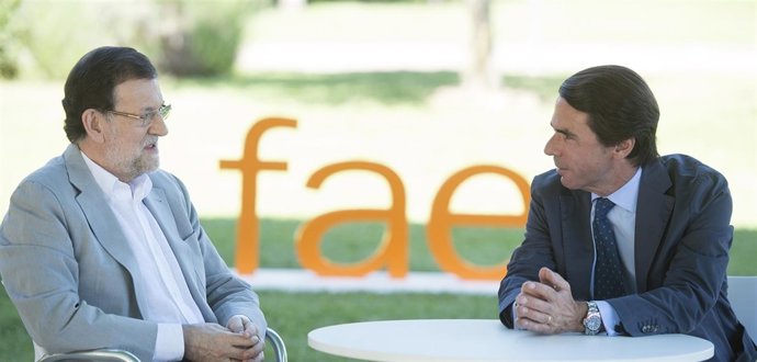 Mariano Rajoy y José María Aznar
