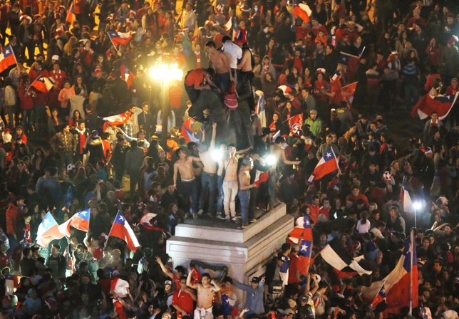 Chilean fans celebrate their team defeating Argentina to win the Copa America 20