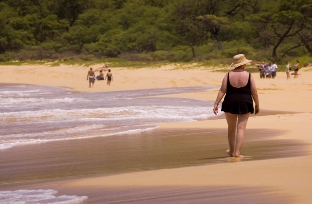 Obesidad, mujer, playa