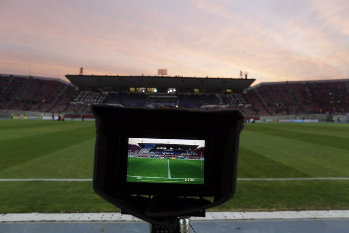 A video camera set up next to the pitch shows the playing field ahead of the the